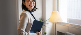 side-view-smiley-business-woman
