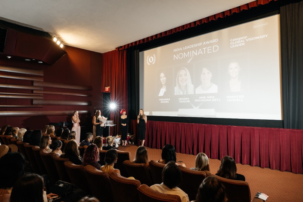 Global Visionary Leader nominees on screen with audience